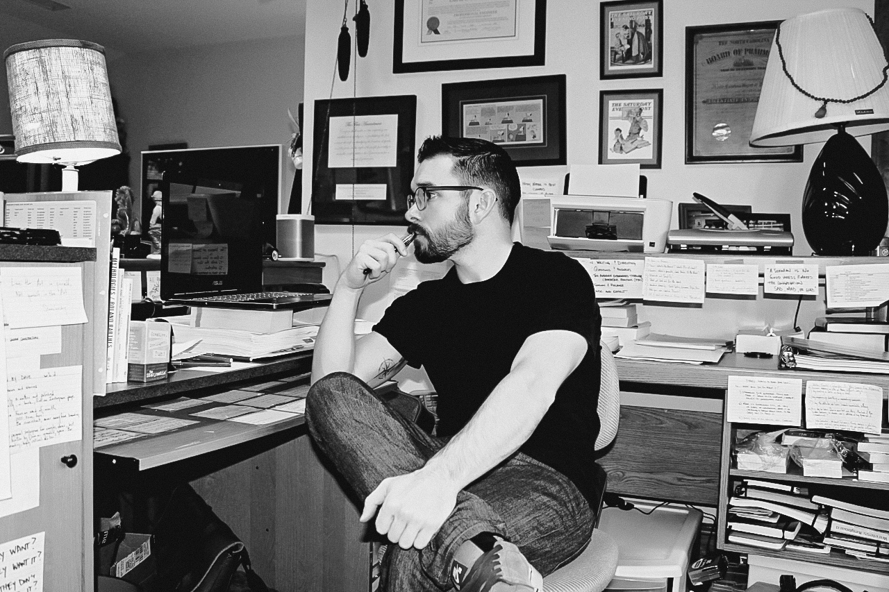 Dave Holton at his desk pondering another effective philosophy for Creativity, Business, & Life